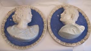 Late 19th Century pair of ceramic plaques 